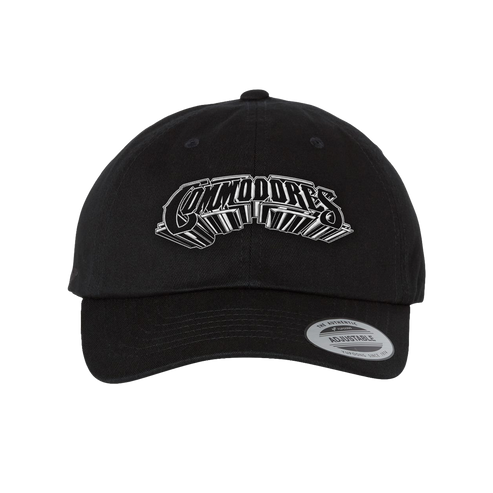 A black baseball cap featuring a stylized white embroidered logo on the front that reads 'Commodores'. 